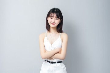 Portrait of Beautiful Asian Woman with her Smooth skin look at camera on White background in Studio light. generative AI.