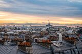 Fototapeta Miasto - Sunrise above Paris skyline, France. View from the roof of old town building