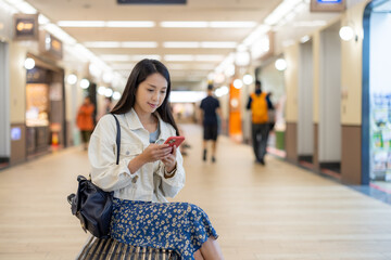 Canvas Print - Woman use of mobile phone in shopping mall