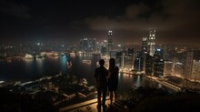 Couple Standing In The Night Sky At Top Of High, Overlooking The CBD City Lights. Created With Generative Technology.