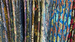 Colorful fabrics or batik with various motifs on a rack stores.