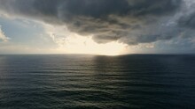 Sunset In Stormy Over Sea Aerial View