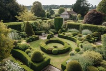 Beautiful English Style Garden With Hedges, & Symmetrical Type Design, With A Large Open Green Lawn For Parties & Open Air Activities. The Garden Is Designed With European Flair, Class And Tradition.