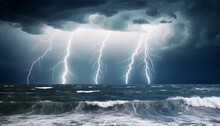 Thunder Storm With Lightening Rages Over Broken Water Of Sea Or Ocean Natural Disaster Apocalyptic Background. Intense Electricity Bolts Emerging From Stormy Clouds Strikes Dramatic Seascape