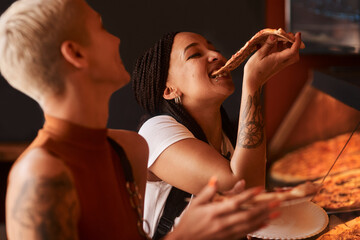 Wall Mural - We just cant resist a good pizza. friends having pizza at a cafe together.