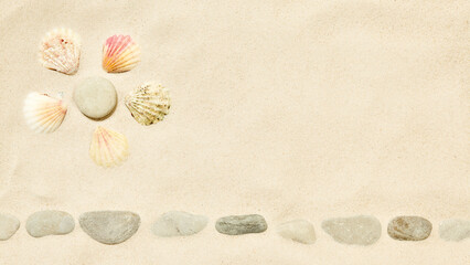 Wall Mural - beach sand with sun symbol of seashells and pebbles