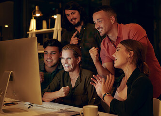 Poster - Look at what we achieved in one night. a group of businesspeople looking at something on a computer in an office at night.