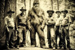 © JoelMasson - Aged historical photograph with a group of Forest Rangers and a Sasquatch. Conceptual image.