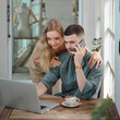 © เลิศลักษณ์ ทิพชัย - Beautiful young couple and handsome creative freelancer working on laptop computer in her studio. Two Caucasian Couples Sitting Outside Workplace