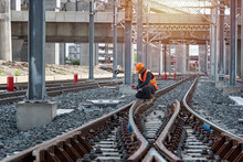 Engineer Sitting On Railway Inspection. Construction Worker On Railways. Engineer Work On Railway. Rail, Engineer, Infrastructure