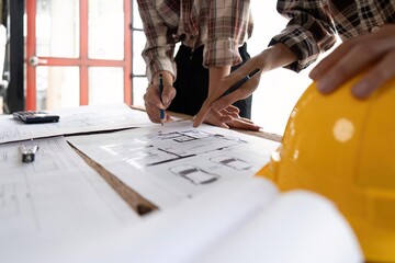 Sticker - Image of team engineer and architect discuss for construction blueprints on new project with engineering tools at desk in office.