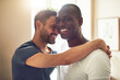 © Flamingo Images - Cheerful alternative gay couple smiling and embracing together