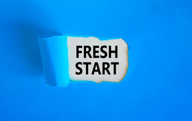 Wall Mural - Fresh start and motivational symbol. Concept words Fresh start on beautiful white paper. Beautiful blue table blue background. Business motivational and Fresh start concept. Copy space.