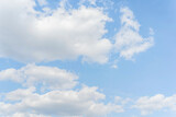 Fototapeta Na sufit - White clouds on a blue sky background.