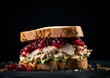 turkey sandwich with cranberry sauce and stuffing on rye bread