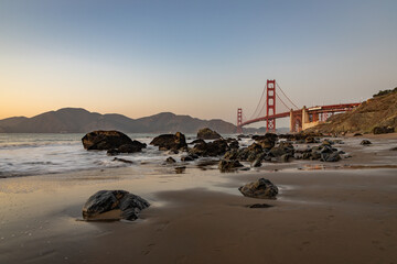 Wall Mural - Golden Gate Bridge and Baker Beach Rocks at Sunset