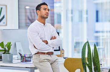 Sticker - Your goals will give you focus and purpose. a young businessman standing in a modern office.