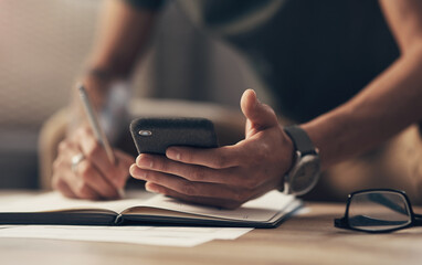 Poster - The smart app that saves you time and money. an unrecognisable man using a smartphone while going through paperwork at home.