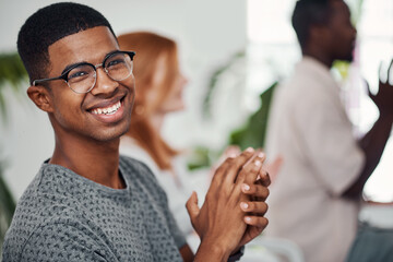 Canvas Print - I really enjoyed this conference. Portrait of a young businessman applauding during a conference.