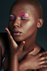 Poster - My soul is a colorful one. a beautiful woman wearing colorful eyeshadow while posing against a grey background.