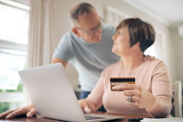 Wall Mural - Making all of our dreams come true. a mature woman using her card to make online payments.