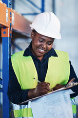 Wall Mural - There is no such thing as gender bias in my warehouse. an attractive young contractor standing in the warehouse and holding a clipboard.