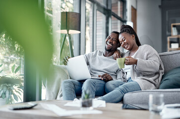 Poster - Who knew staying home could be the best cinematic experience. a young couple using a laptop together on the sofa at home.