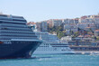 Cruise ship in city port in city port for tourist travel on sunny day. It waits at the port of Galataport , the tourist port of Istanbul.