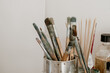 © Austockphoto - Paintbrushes in an art studio.