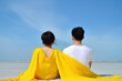© dewaai - a couple sitting on a beach. sweet couple happy relax enjoy love and romantic moment
