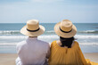 © dewaai - a couple sitting on a beach. sweet couple happy relax enjoy love and romantic moment