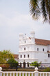 Catholic Church of St. Francis of Assisi during sunny day at Goa in India. Church built by the Portuguese at Goa. Old and famous church of Goa. Cross on top of the catholic church. 