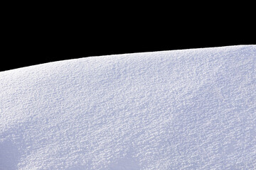 Wall Mural - white snow in daylight, background, isolate on black background