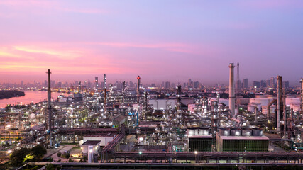 Canvas Print - Aerial view oil and gas industry refinery at sunset, Aerial view oil and gas Industrial petrochemical fuel power and energy, Refinery factory oil storage tank and pipeline steel.