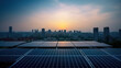 © Syntetic Dreams - Solar panels mounted on building roof top, panoramic view city skyscape at sunset. Clean ecological electricity production, renewable energy concept