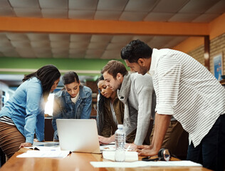 Wall Mural - You all need to see this. a group of university students studying in the library.