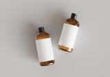 Fototapeta  - Two brown plastic cosmetic containers with labels, shampoo bottles laying on gray background front view 3D render mockup