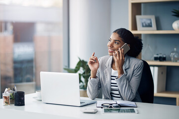 Aufkleber - If anyone knows how to make it happen she does. a young businesswoman using a smartphone at her desk in a modern office.