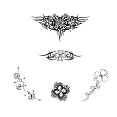 ornaments for a tattoo with clover flowers. Vector black and white drawing eps 10
