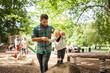© Astrakan Images - Father with daughter (2-3) in playground