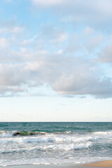 Naklejka na meble Background image of turquoise sea and sandy coast on a sunny day.