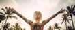 A blonde tattooed woman stands from behind, in an idyllic holiday landscape, showing her freedom through her raised arms. Her tattoo is clearly visible on her back. Generative AI