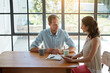 © Reese/peopleimages.com - They make every decision together. a married couple using their tablet while drinking coffee together at home.