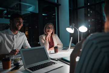 Poster - They know the true meaning of dedication. colleagues having a meeting during a late night in a modern office.