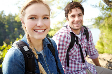 Enjoying the fresh air. A happy young couple spending time together outdoors in nature.