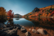 Stunning Autumn Landscape With A Lake Surrounded By Mountains, Trees With Leaves In Shades Of Orange, Yellow, And Red, And A Clear Blue Sky, Generative Ai