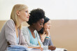 © Nicola Katie/peopleimages.com - Class is in session. female university students sitting in an exam room.