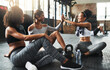 © Delmaine D/peopleimages.com - Workout buddies keep you motivated. young women giving each other a high five while taking a break at the gym.