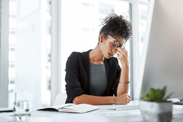 Aufkleber - Something has to change. a young businesswoman experiencing stress while working at her desk in a modern office.