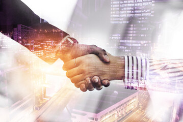 Poster - Well done. Closeup shot of two unrecognizable businesspeople shaking hands in an office.